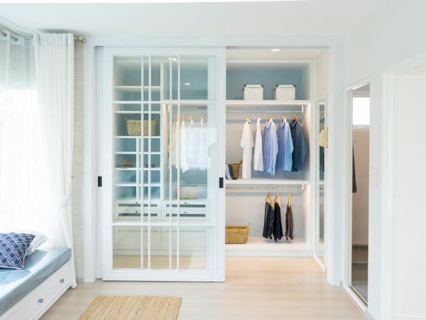 Modern wardrobe with glass doors