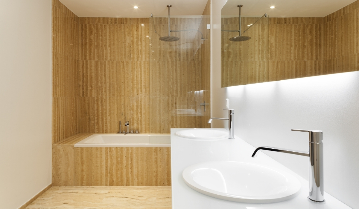 Designer bathrooms for country houses with wood-textured porcelain tiles