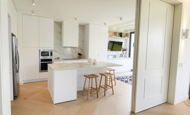 White kitchen with modular furniture in lacquered mdf